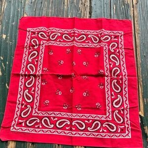 Red bandana scarf with white paisley design
